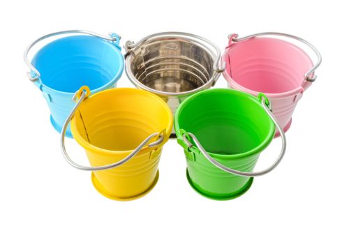 Isolated objects: five colorful buckets, arranged as a symbol of Olympic Games, isolated on white background