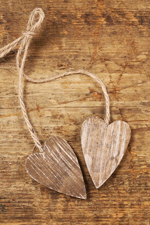 tied wooned hearts on old  wood rustic style